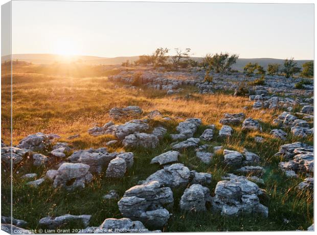 UK, Yorkshire, sun setting over Southerscales Scars limestone pavement Canvas Print by Liam Grant