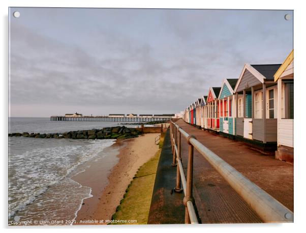 UK, Suffolk, Southwold pier and colourful beach huts at sunrise Acrylic by Liam Grant