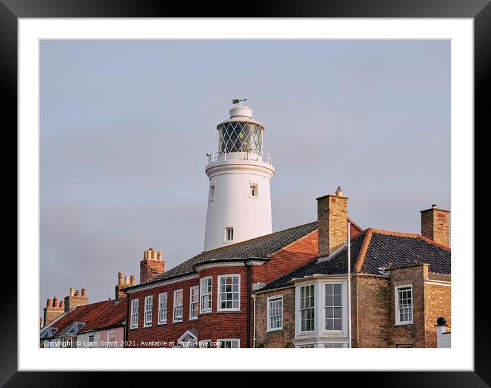 UK, Suffolk, Light from the sunrise on southwold lighthouse Framed Mounted Print by Liam Grant