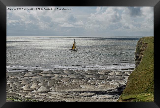 Yacht crossing infront of Nash Point Beach  Framed Print by Nick Jenkins