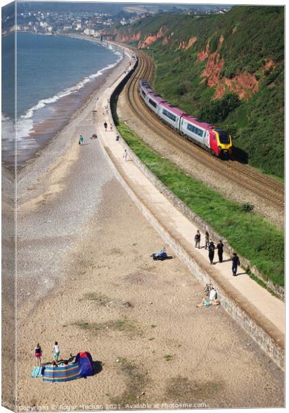 Express Train Racing along the Coastal Cliffs Canvas Print by Roger Mechan