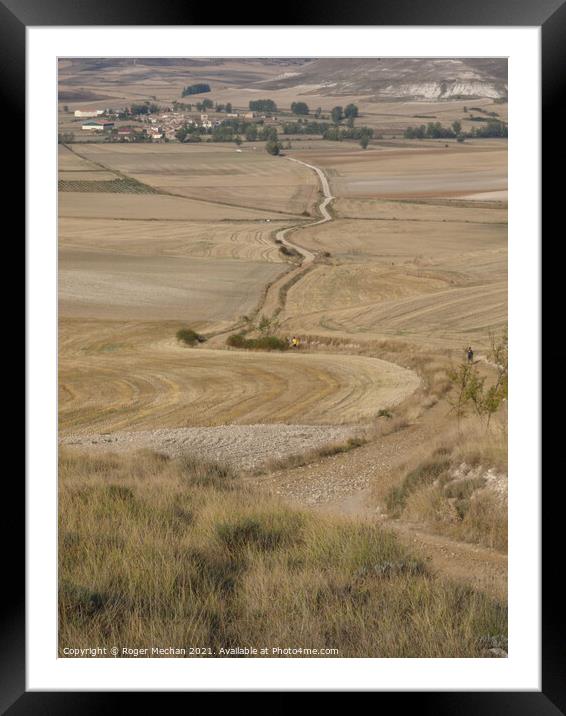 Trekking through an Arid Landscape Framed Mounted Print by Roger Mechan