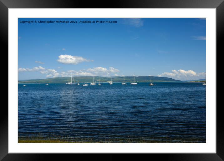 Sailing boats out on the coastal Scottish sea Framed Mounted Print by Christopher McMahon