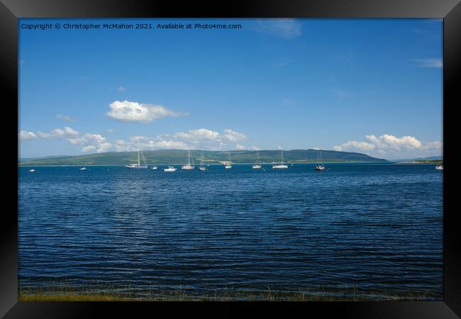 Sailing boats out on the coastal Scottish sea Framed Print by Christopher McMahon