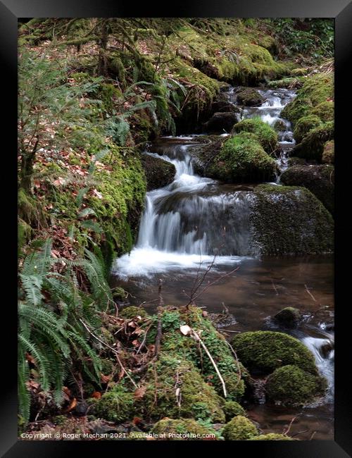 Mossy Waterfall Symphony Framed Print by Roger Mechan