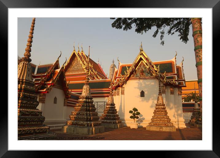 A group of small stupa at Phra Chedi Rai Buddha te Framed Mounted Print by Hanif Setiawan
