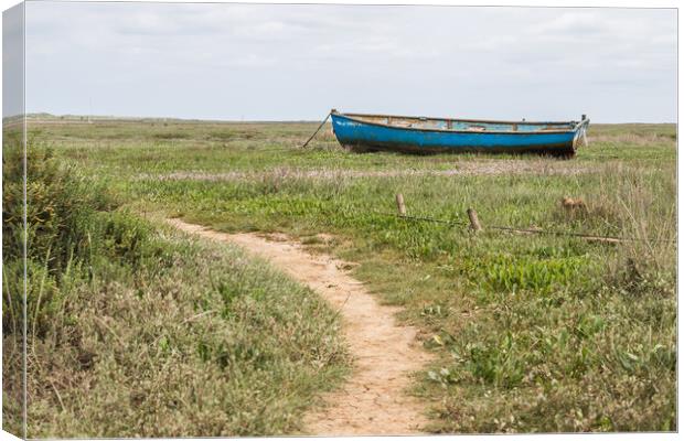 Boat stranded at Brancaster Staithe Canvas Print by Jason Wells