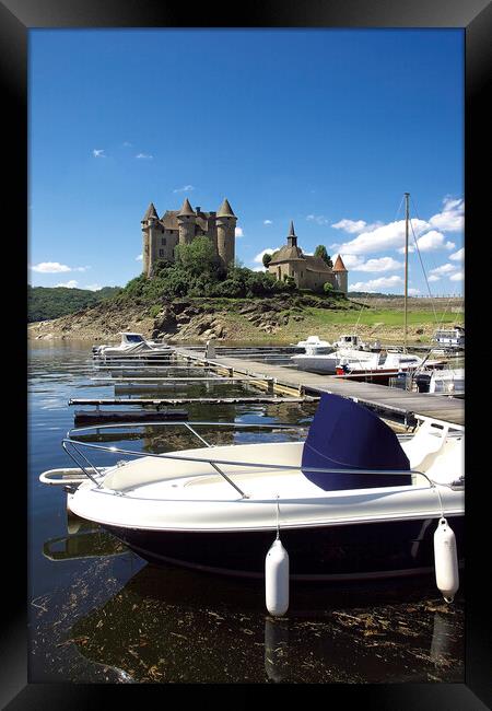 Ancient Castle Overlooking Tranquil Lake Framed Print by Roger Mechan