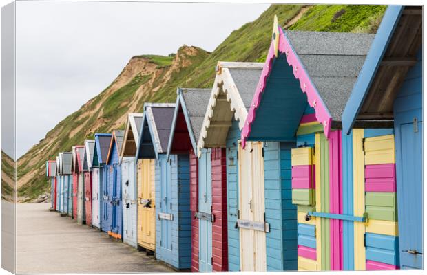 Pretty beach huts on Sheringham seafront Canvas Print by Jason Wells