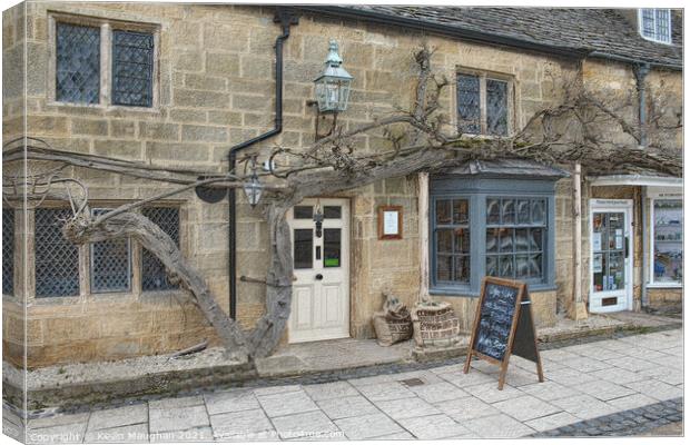 A Quaint Coffee Haven in the Heart of Cotswolds Canvas Print by Kevin Maughan
