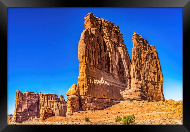 Courthouse Towers Park Avenue Section Arches National Park Moab  Framed Print by William Perry