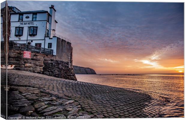 The Majestic Sunrise over Robin Hoods Bay Canvas Print by Richard Perks