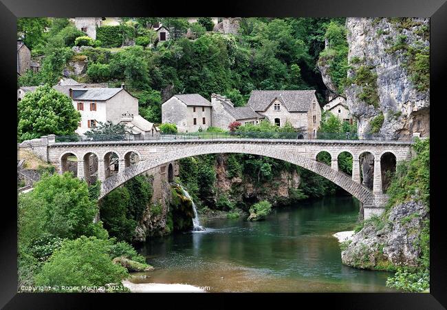 Idyllic Stone Village with Arched Bridge Framed Print by Roger Mechan