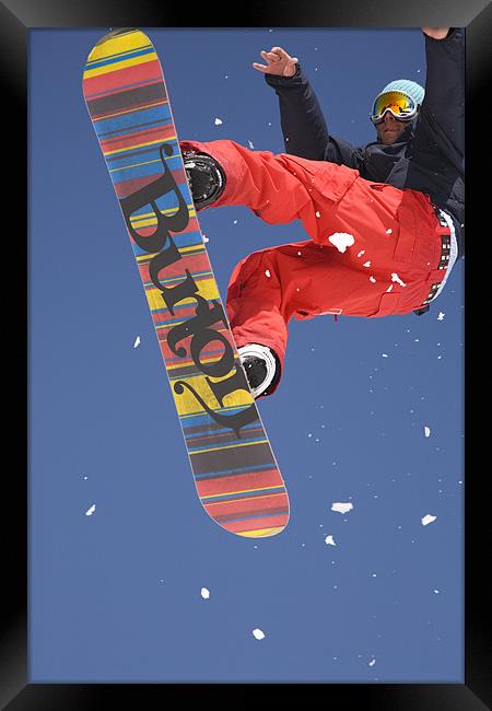Snowboard jumping on Vogel mountain Framed Print by Ian Middleton