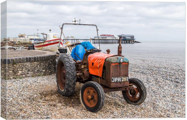 Old tractor on Cromer beach Canvas Print by Jason Wells