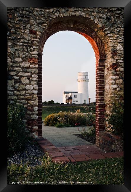 The Lighthouse In Old Hunstanton At Sunset Through The Archway Of Framed Print by Peter Greenway