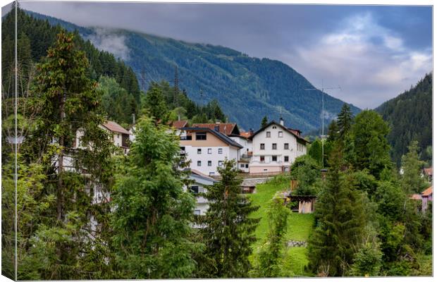 Typical village in the Austrian Alps Canvas Print by Erik Lattwein