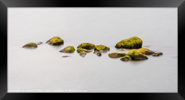 Rocks in Water Panoramic. Framed Print by Anthony Dillon