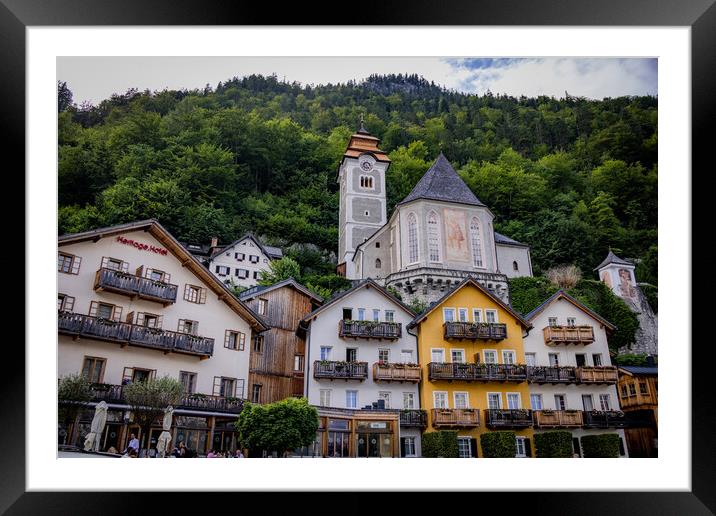 Beautiful Hallstatt in Austria - a very popular place in the Austrian Alps - HALLSTATT, AUSTRIA, EUROPE - JULY 30, 2021 Framed Mounted Print by Erik Lattwein