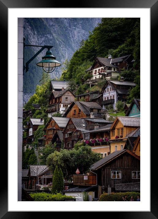 The amazing houses of Hallstatt in Austria - HALLSTATT, AUSTRIA, EUROPE - JULY 30, 2021 Framed Mounted Print by Erik Lattwein
