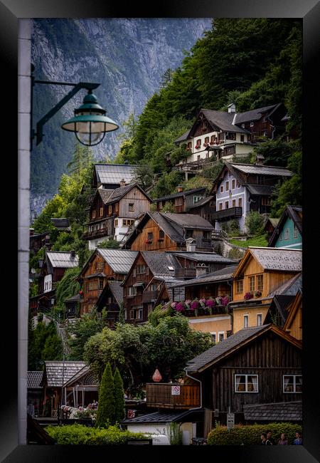 The amazing houses of Hallstatt in Austria - HALLSTATT, AUSTRIA, EUROPE - JULY 30, 2021 Framed Print by Erik Lattwein