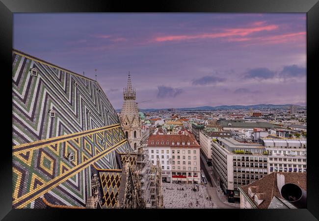 View over the city of Vienna from the top of St Stephans Cathedral Framed Print by Erik Lattwein