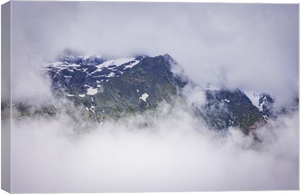 Clouds at Grossglockner Mountain Road in Austria Canvas Print by Erik Lattwein