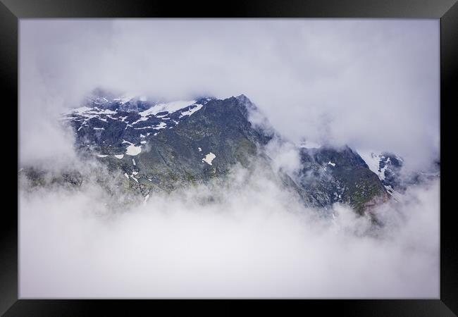Clouds at Grossglockner Mountain Road in Austria Framed Print by Erik Lattwein