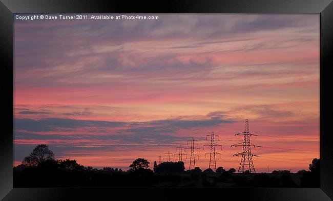 Pylons at Sunset, Norfolk Framed Print by Dave Turner
