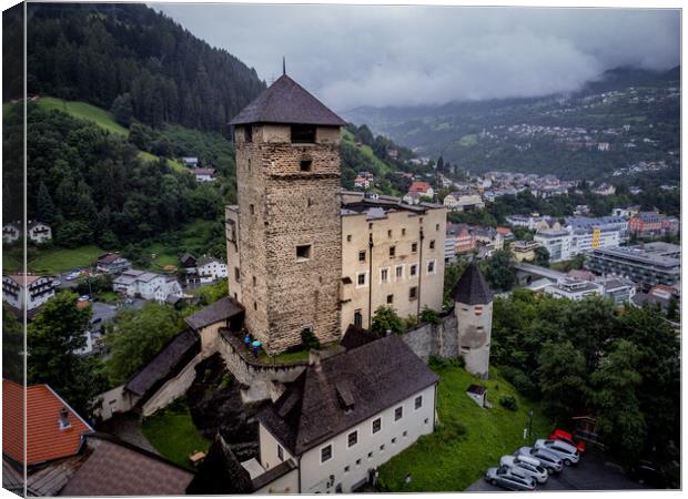 Landeck Castle in the Tyrolean village of Landeck in Austria - ISCHGL, AUSTRIA, EUROPE - AUGUST 5, 2021 Canvas Print by Erik Lattwein