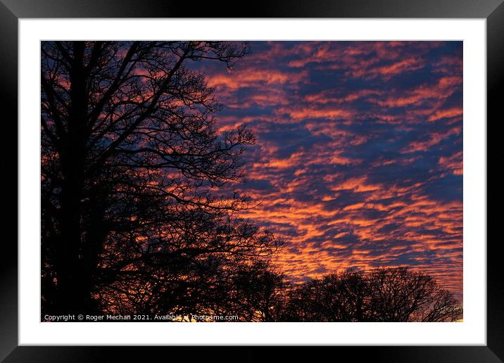 Fiery Winter Sunset Framed Mounted Print by Roger Mechan