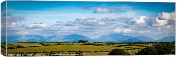 View to Snowdon from Anglesey Canvas Print by Peter Taylor