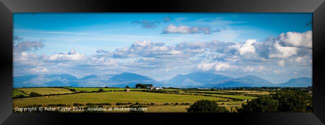 View to Snowdon from Anglesey Framed Print by Peter Taylor