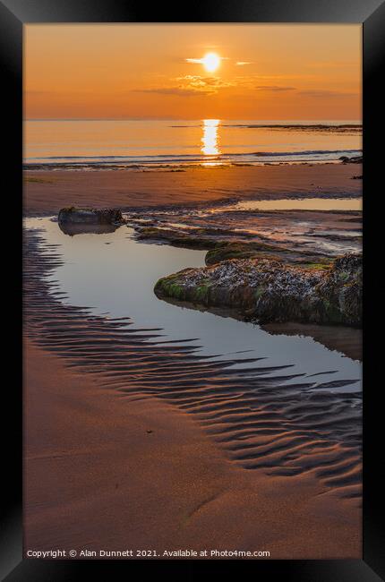 Sunrise and shadows on Embleton Beach, Northumbria Framed Print by Alan Dunnett