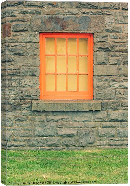 Stone hut orange window Canvas Print by Dan Davidson