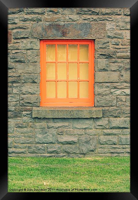 Stone hut orange window Framed Print by Dan Davidson