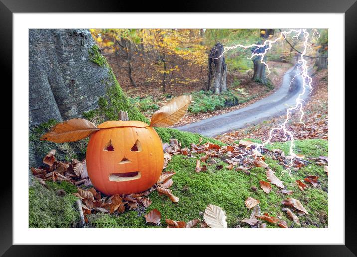 Scary halloween pumpkin alive in the woods Framed Mounted Print by Simon Bratt LRPS
