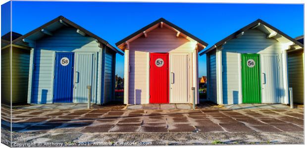 The Three Beach Huts Canvas Print by Anthony Dillon