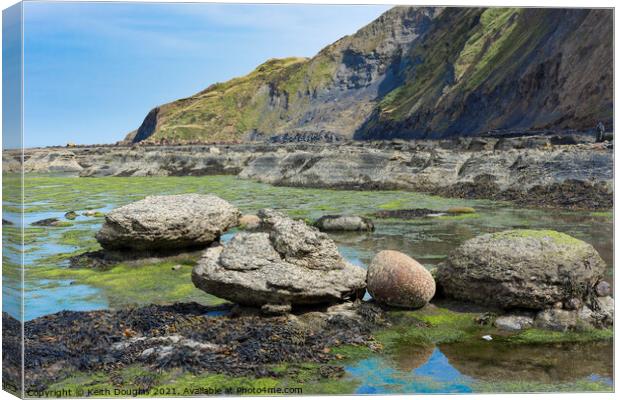 Rocks in Robin Hoods Bay, North Yorkshire Canvas Print by Keith Douglas