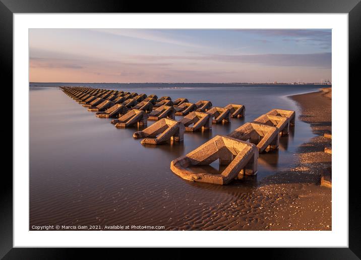 Breakwater at sunset Framed Mounted Print by Marcia Reay