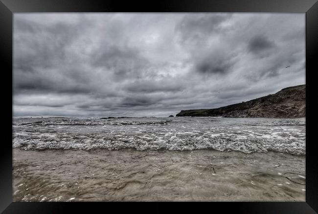 Stormy beach with waves Framed Print by Ollie Hully