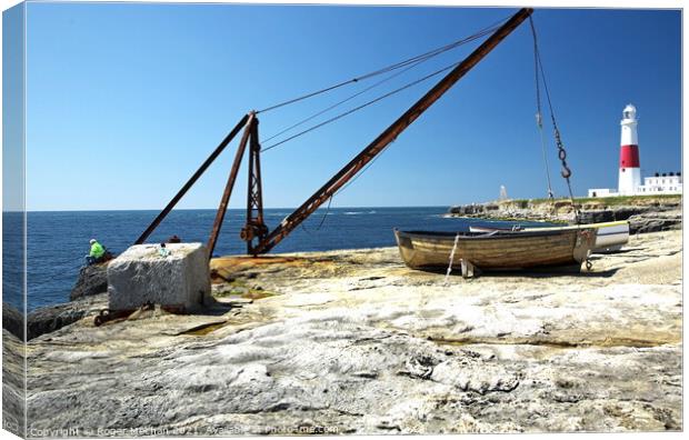 Guiding Light at Portland Bill Canvas Print by Roger Mechan