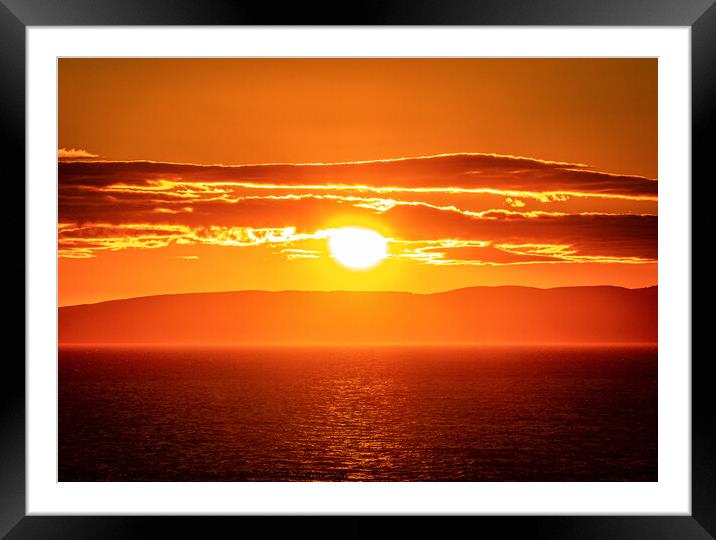 sunset over the isle of Arron Scotland  Framed Mounted Print by christian maltby