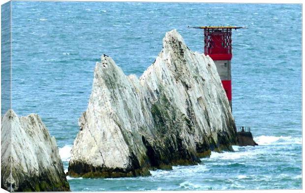 Iconic Needles Lighthouse Isle of Wight Canvas Print by Roger Mechan