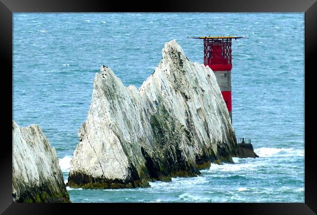 Iconic Needles Lighthouse Framed Print by Roger Mechan