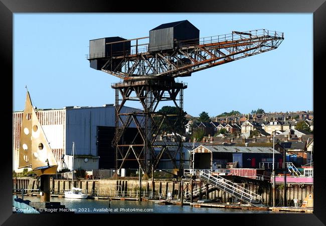 Hammerhead crane on Cowes Isle of Wight Framed Print by Roger Mechan