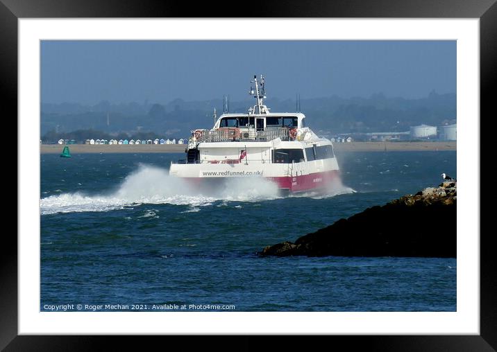 Catamaran Leaving Cowes Isle of Wight. Framed Mounted Print by Roger Mechan