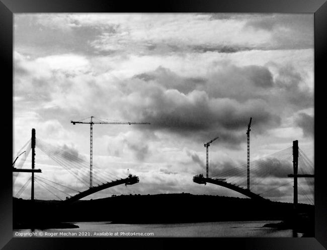 Bridging the Gap Framed Print by Roger Mechan