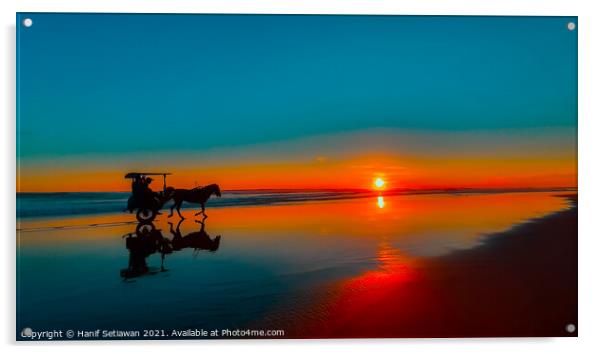 Horse-drawn carriage at sunset on beach Acrylic by Hanif Setiawan
