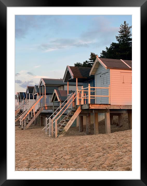 Beach huts at sunset on Holkham beach Framed Mounted Print by suzie Attaway